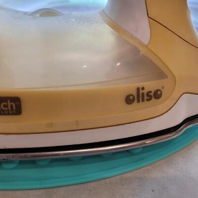 Lot 510: Oliso ittouch Iron and Ironing Rest Pad 