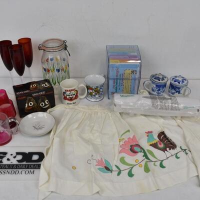 18 pc Kitchen Misc: 2 Aprons, Recipes, 3 Mugs, 3 Champagne Glasses, 3 Candles