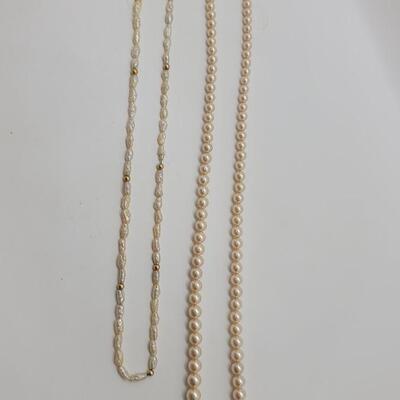 J56 - Two Pearl Necklaces. One Freshwater Pearls with 14K Clasp and Beads. One in Costume Pearls.