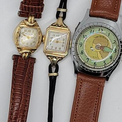 Lot J63 - Watches lot includes Disney, Antique Ladies Elgin & Bulova.