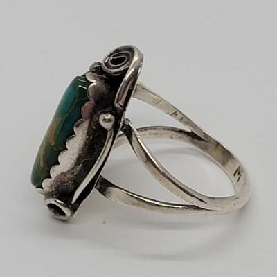 Lot J65 - Sterling turquoise ring size 7