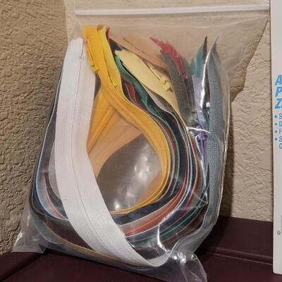 Lot 525: Assortment of New and Used Zipper Tracks + New Velcro Pack