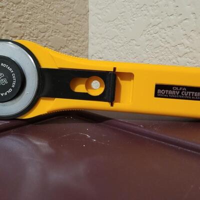 Lot 535: (2) OLFA Rotary Cutters (45mm & 28mm)