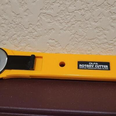 Lot 535: (2) OLFA Rotary Cutters (45mm & 28mm)