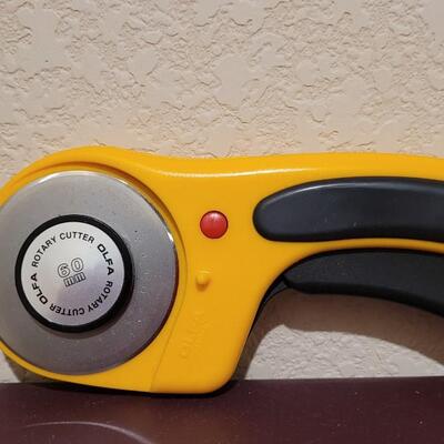 Lot 536: (2) 60mm OLFA Rotary Cutters 