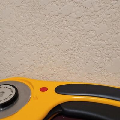 Lot 536: (2) 60mm OLFA Rotary Cutters 