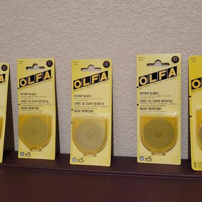 Lot 537: Assortment of NEW Sealed OLFA Rotary Cutting Wheels