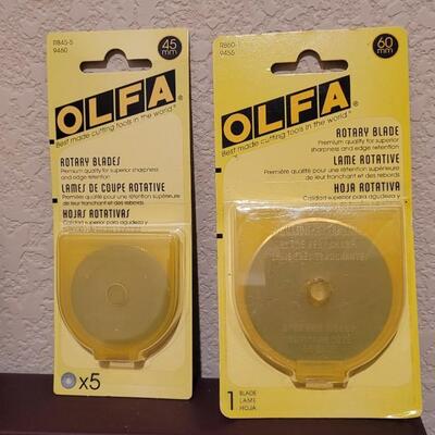 Lot 537: Assortment of NEW Sealed OLFA Rotary Cutting Wheels