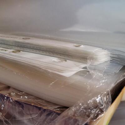 Lot 553: Office / School Supplies Bundle - Tape Dispensers, Protectors, Staple Puller and Clipboard