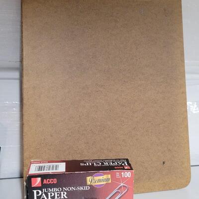 Lot 553: Office / School Supplies Bundle - Tape Dispensers, Protectors, Staple Puller and Clipboard