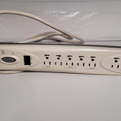 Lot 556: Safety Cord Surge Protector 