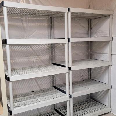 Lot 569: (2) Plastic Shelving Units (both show some dings)