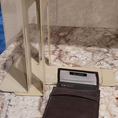 Lot 591: Metal Bookends and HP 10b (doesn't turn on)