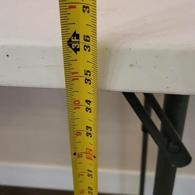 Lot 597: Adjustable Folding Table
