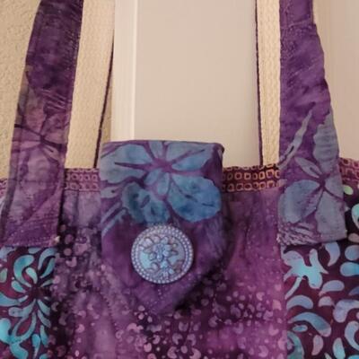 Lot 606: Quilted Bag (has ink stain on inside only)