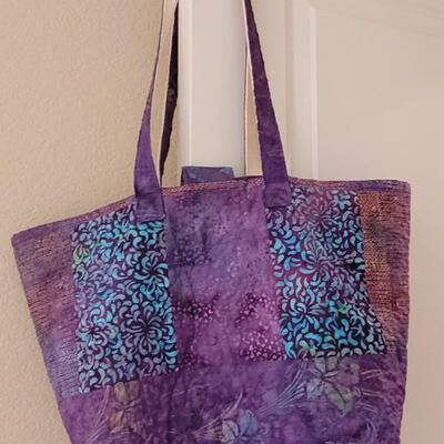 Lot 606: Quilted Bag (has ink stain on inside only)