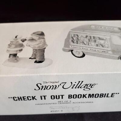 Gifts on the Go - Check it out Bookmobile - Chopping Firewood 