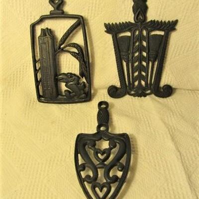 Set of Three Vintage Cast Iron Trivets by Wilton and Oread