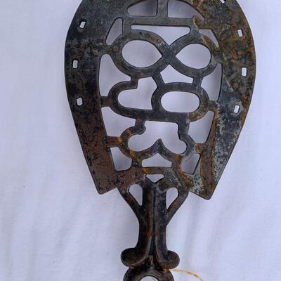Lot of 7 antique cast iron trivets