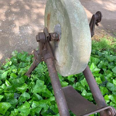 Primitive antique grinding wheel
