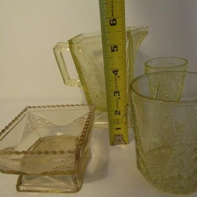 4 Pieces of Uranium Glass (Small Pitcher, Square Dish, Glass, and Stemmed Glass)