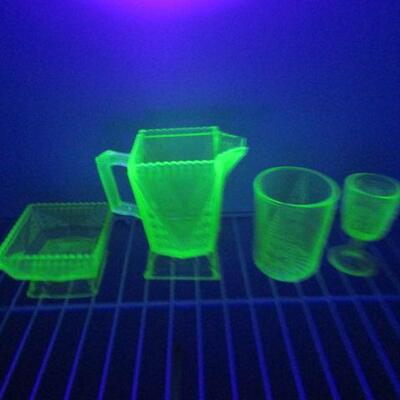 4 Pieces of Uranium Glass (Small Pitcher, Square Dish, Glass, and Stemmed Glass)