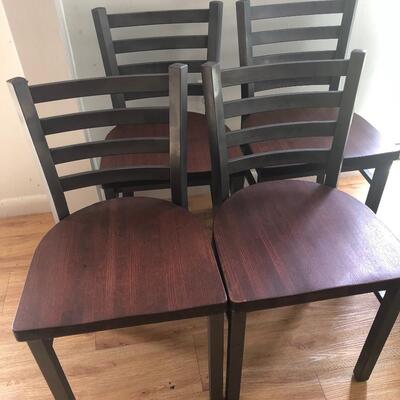 Four vintage heavy metal and wood chairs