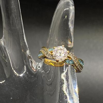 Goldtone Twisted Clear & Blue CZ Ring