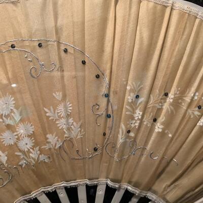 Beautiful hand-carved, hand-painted and hand-sewn vintage Japanese fan.