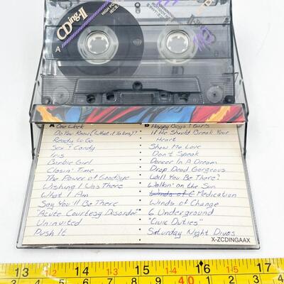 VINTAGE MIXED MUSIC CASSETTE TAPES WITH SUPERHERO COVERS