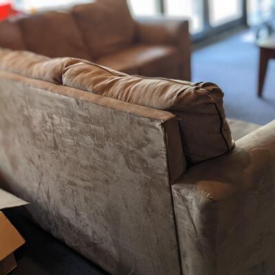 Brown Leather sectional couch