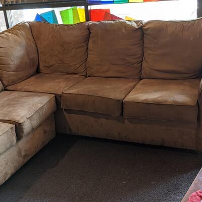 Brown Leather sectional couch