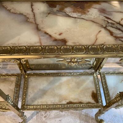Extraordinary Brass & Marble Etagere with bevelled mirror and marble shelves.