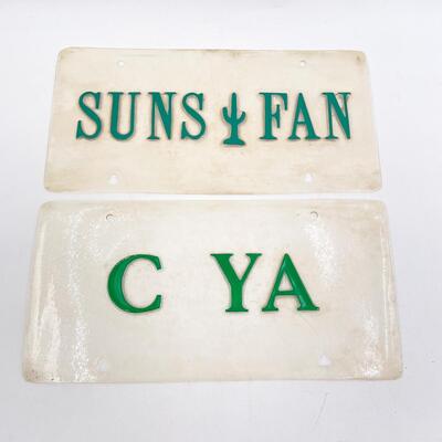 CLEAR â€œC YAâ€ & â€œSUNS FANâ€ LICENSE PLATE COVERS