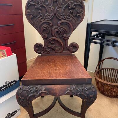 Handcarved antique wood chair.