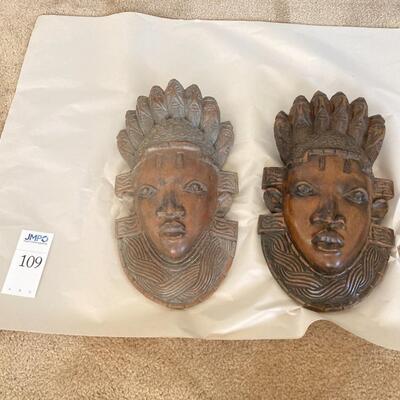 African carved faces
