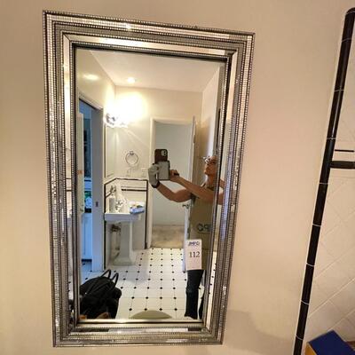 Bathroom mirror and grooming items