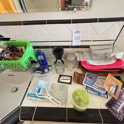 Bathroom mirror and grooming items