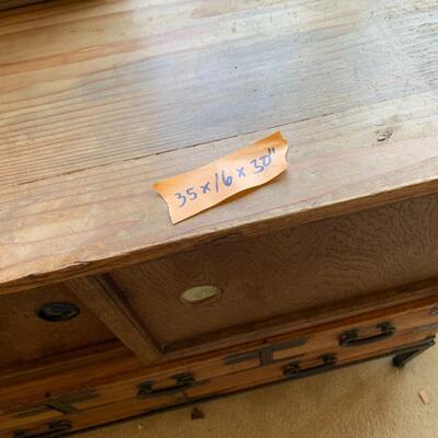 Chinese chest of drawers and lamp. 
