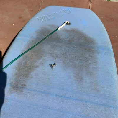 Boogie boards and chair