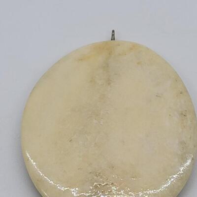 J98: Handcrafted  carved pendant on bone