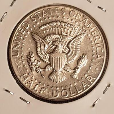 90 % Silver 1964 AU kennedy half dollar 