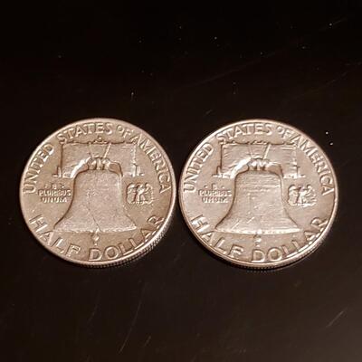 2 silver Franklin half dollars 