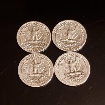 4 various date silver quaters 