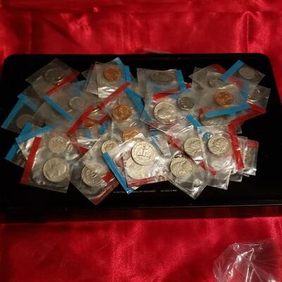 Lot of unsearched  1970 ,s mint coins aproxx 100 coins 50 c to 1 c 