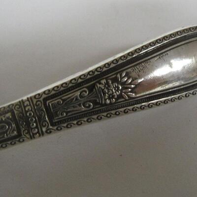 Webster Sterling Handle Fancy Serving Spoon and Holmes and Edwards Silver Inlay Teaspoon