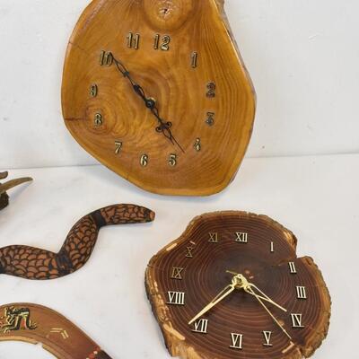 9 pc Decor: 2 clocks, 2 faux snakes, Boomerang, Ceramic Pie Plate