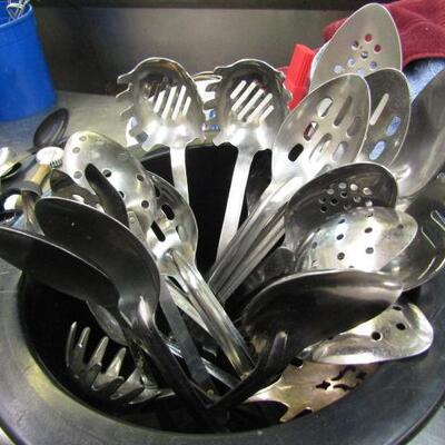 Crock Full of Assorted Spoons:  Slotted, Solid, Pasta Servers