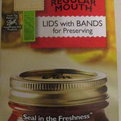 #64 New Box of regular mouth lids and bands