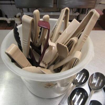 Assortment of Metal Spoons and Plastic Tongs and Ladles for Salad Bar